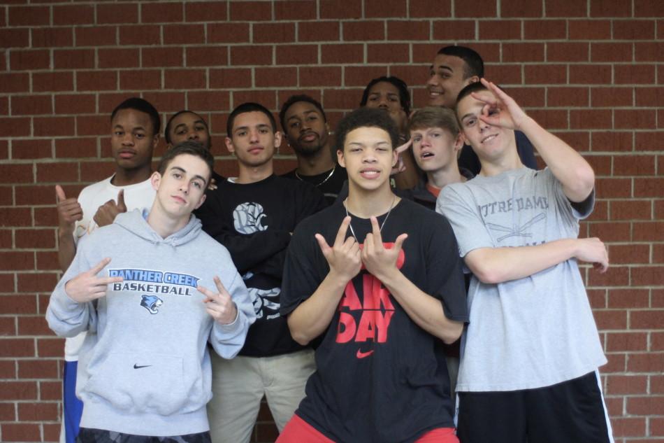 Members of the basketball team are hyped  for the game against Millbrook.